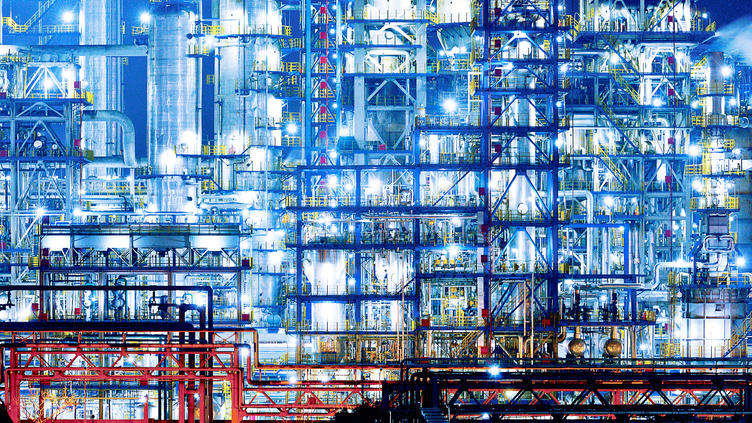 Close-up refinery & chemical plant at night
