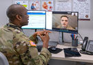 military doctor speaking with service member on a virtual call