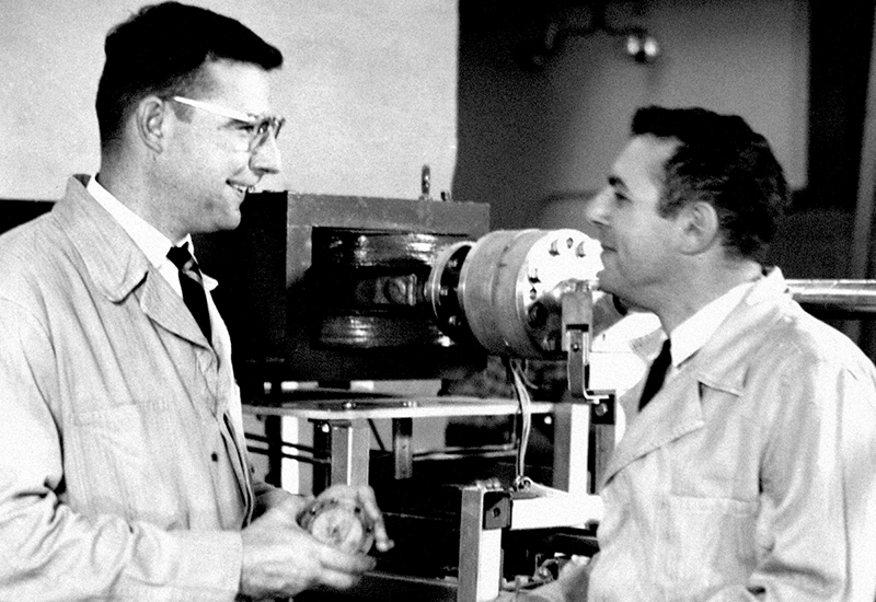 Dr. Beyster is shown with a colleague when he worked as a nuclear physicist