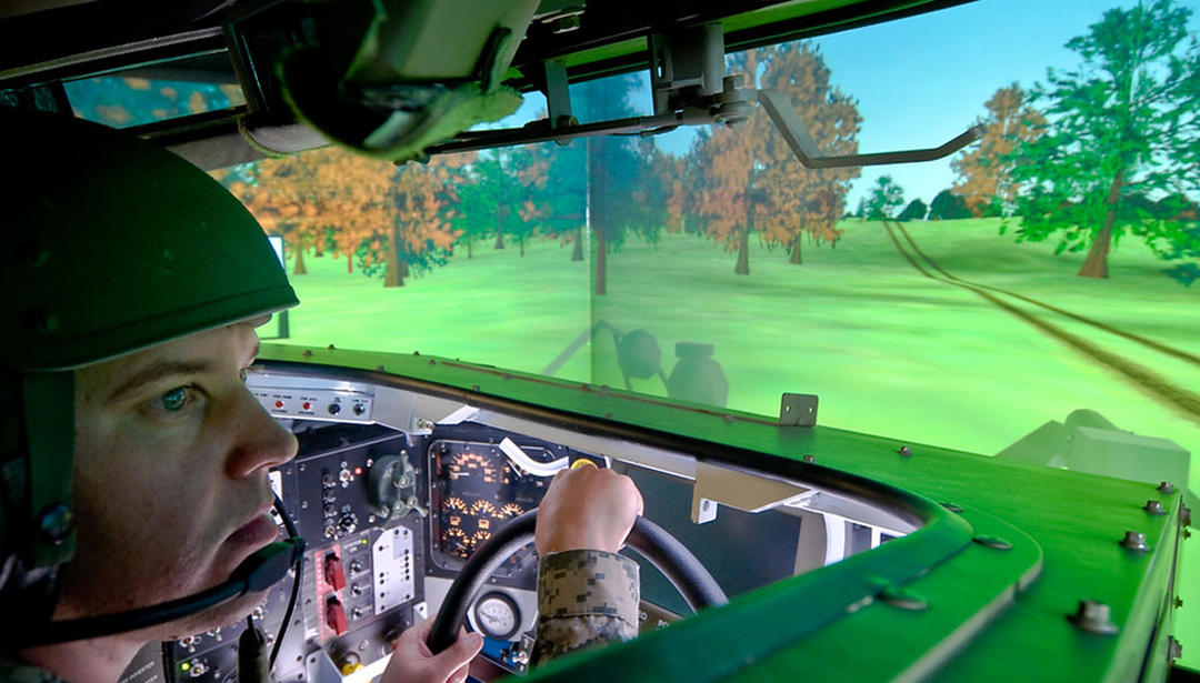 Solider in a military simulation vehicle
