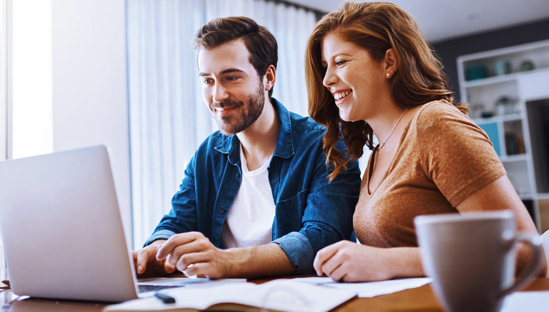 couple looking at computer
