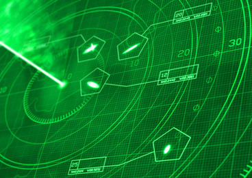 Military radar simulation with green display, showing a glowing grid with coordinates and positioning numbers