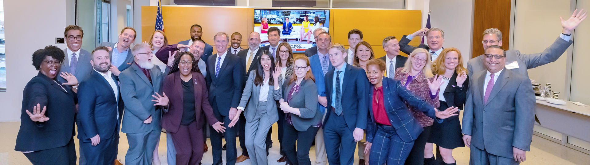 Leidos employees after a leadership conference