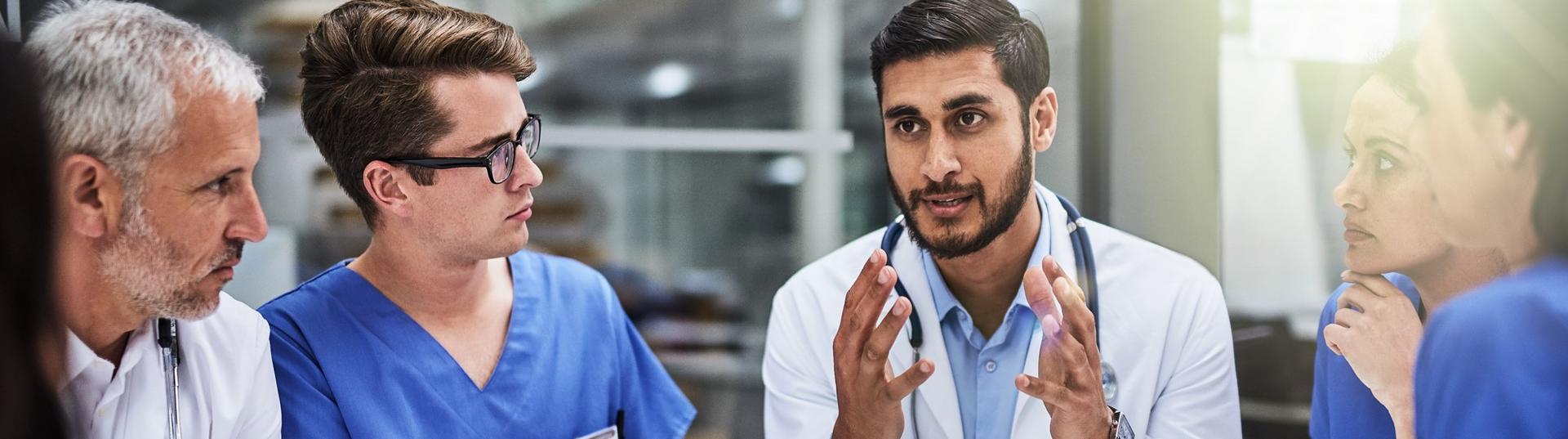 group of healthcare professionals in conversation