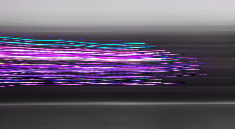 520067d462b5f7b82620f8368e9d323a.png Abstract aqua, Pink, purple, white light traveling through dark background