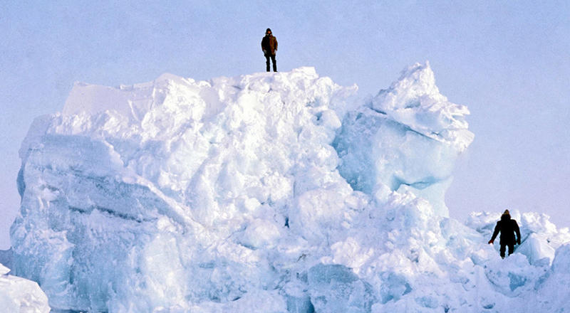 b389bfb9ac54dfbda0841af655cc04c0.jpg Dr. Peter Mikhalevsky atop an iceberg