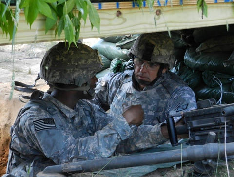 JB HOL training Leidos employee and veteran JB training a soldier