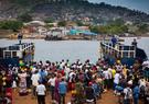 A ferry docking at the harbor of Freetown in Sierra Leone.