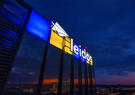 Leidos Global HQ building lit in the colors of Ukraine
