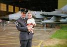 Mick with baby Connor working at RAF Waddington Airshow, 1998