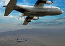 C-130 Aircraft completing aerial docking of X-61A GAV