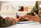 Military doctors consulting one another