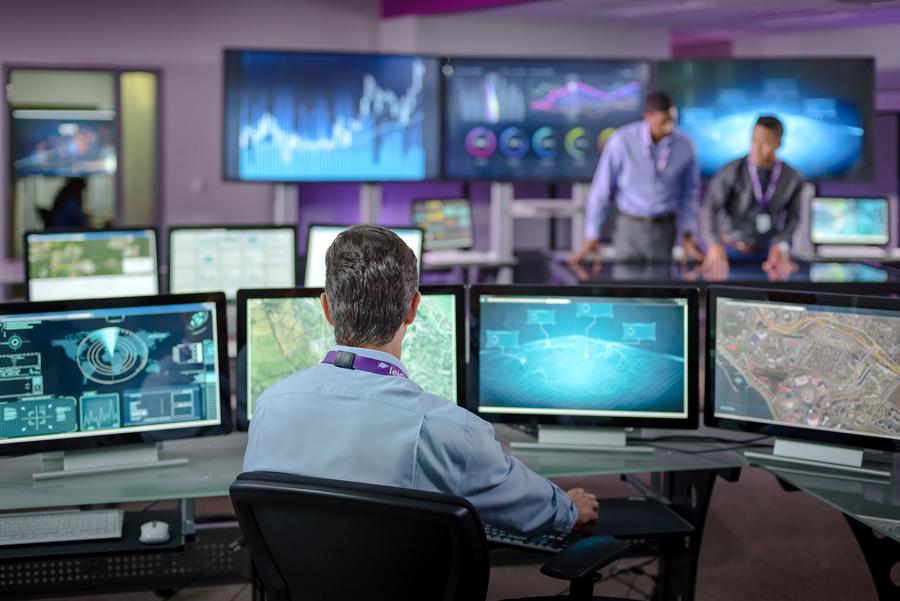Leidos employees using dashboards and geospatial technology 