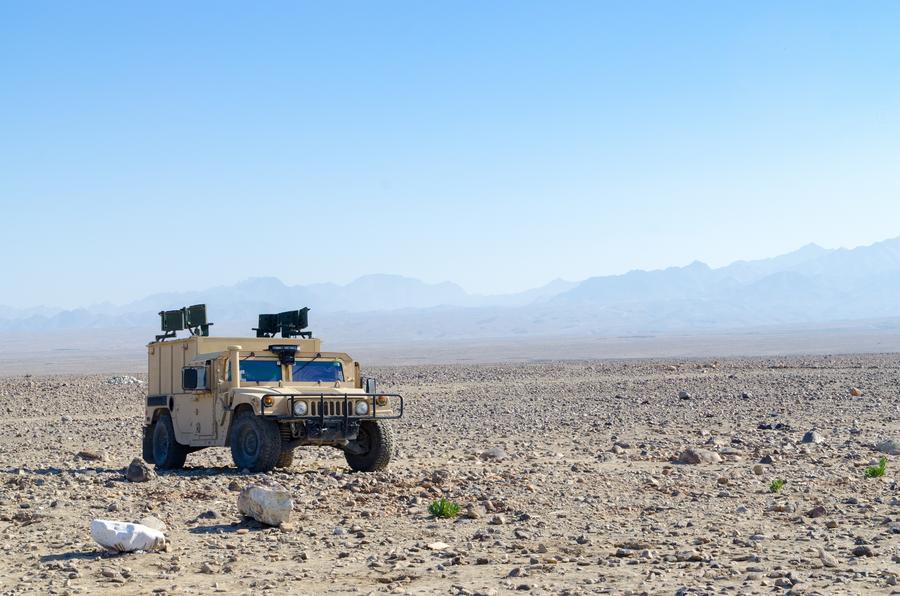 Military vehicle in desert 