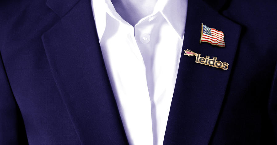 Veteran employee with United States pin and Leidos pin
