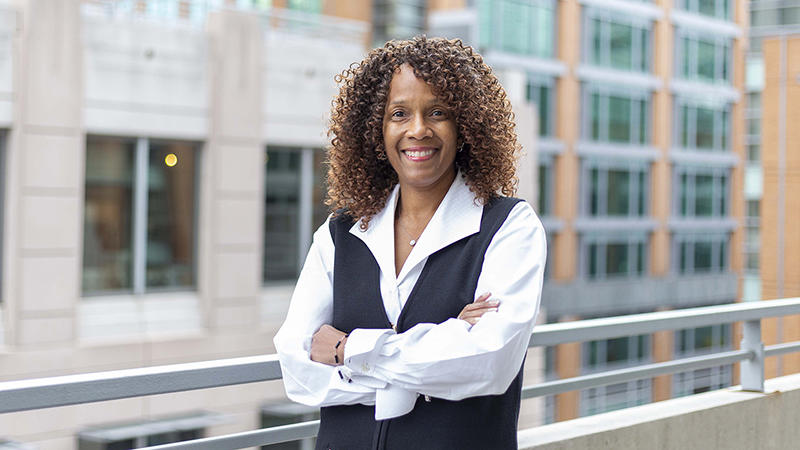 Karyta Barnes on a balcony