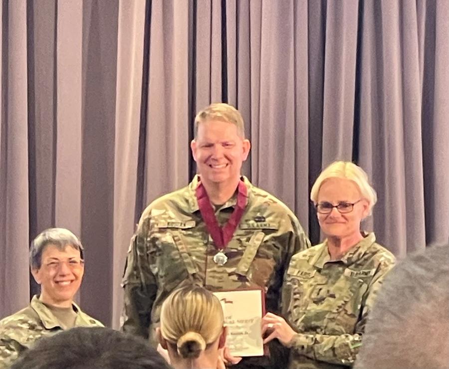 Don Kosiak accepting a medal