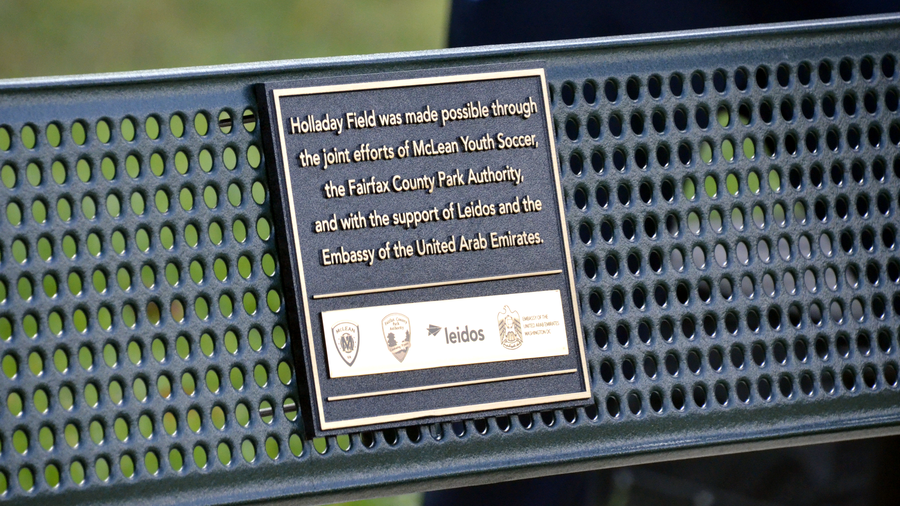 dedication plaque on park bench