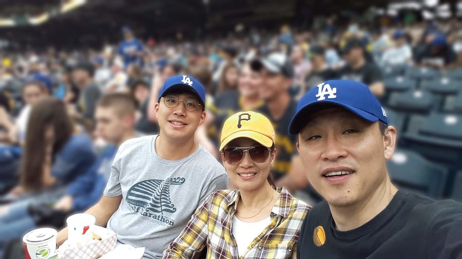 Dr. Shiwoo Lee and his family at a baseball game