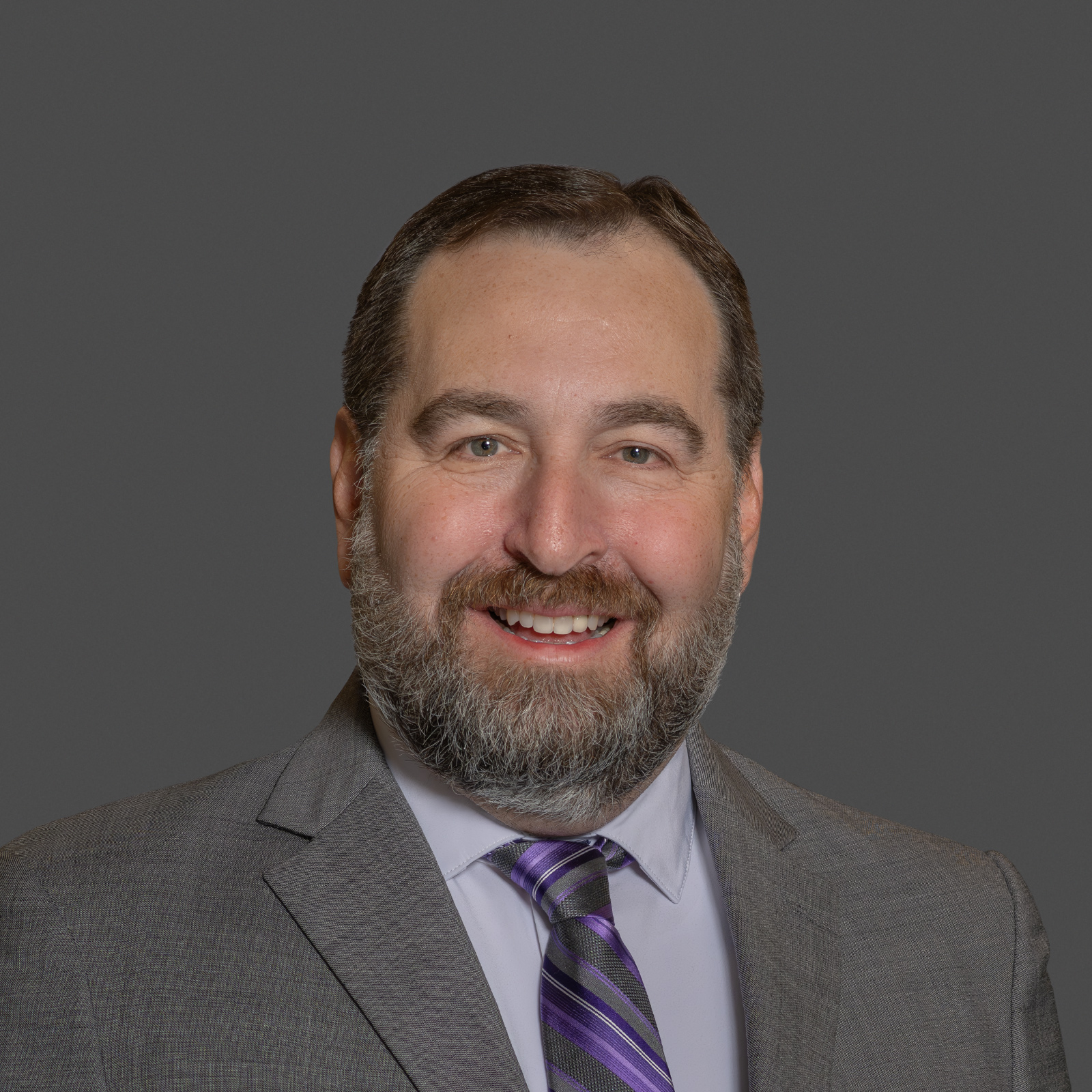 A headshot of Josh Salmanson
