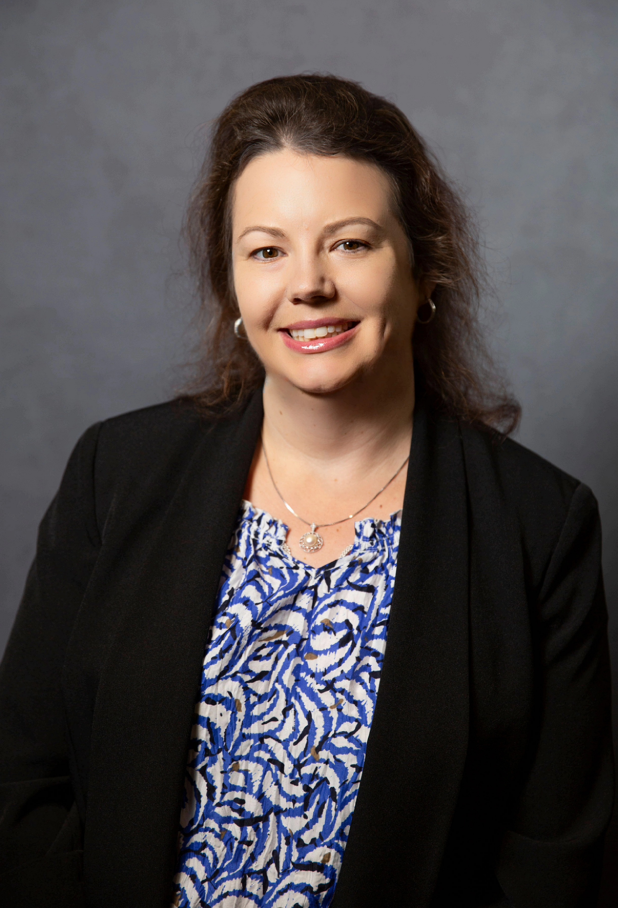 A professional headshot of Lynsey Caldwell