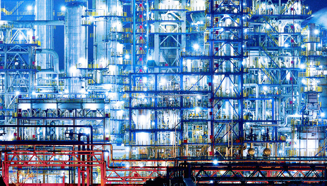 Close-up refinery & chemical plant at night