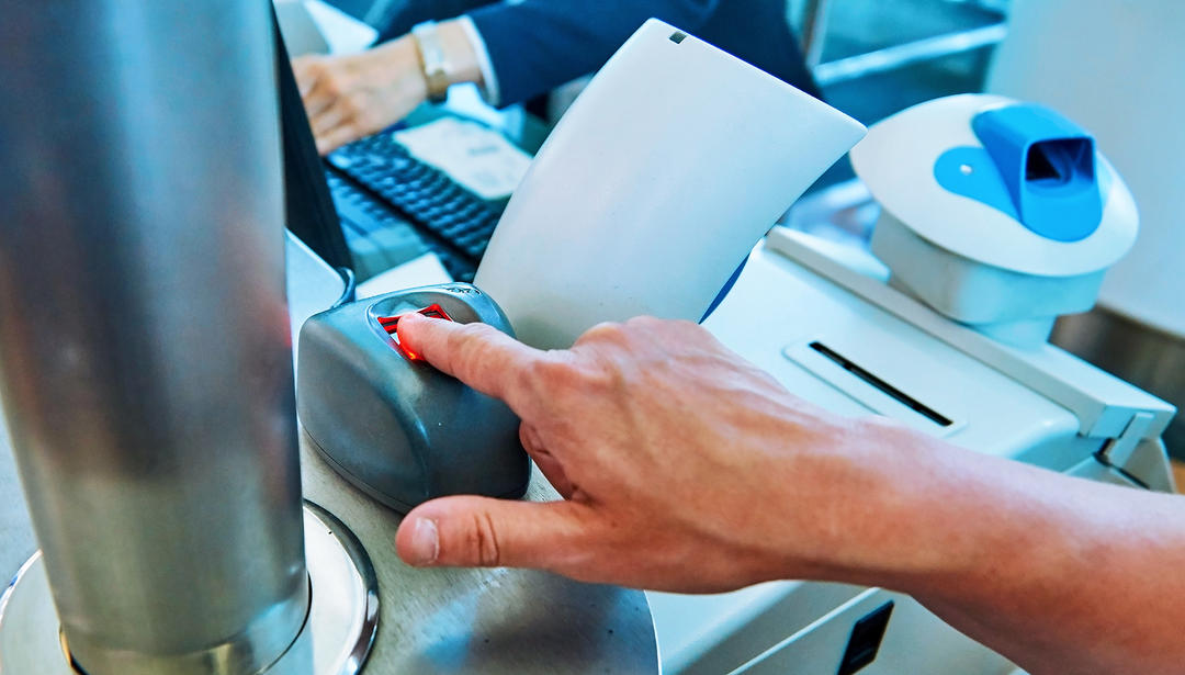 finger on fingerprint scanner