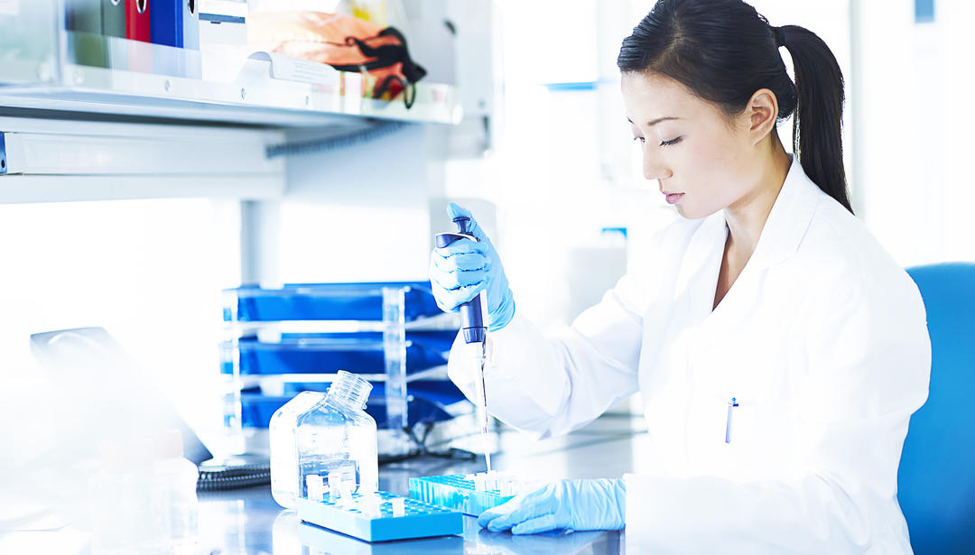 scientist with pipette