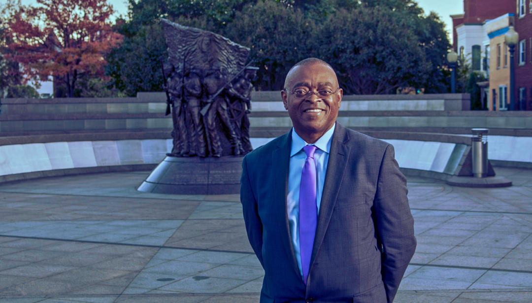 Leidos employee standing outside the African American Civil War Memorial