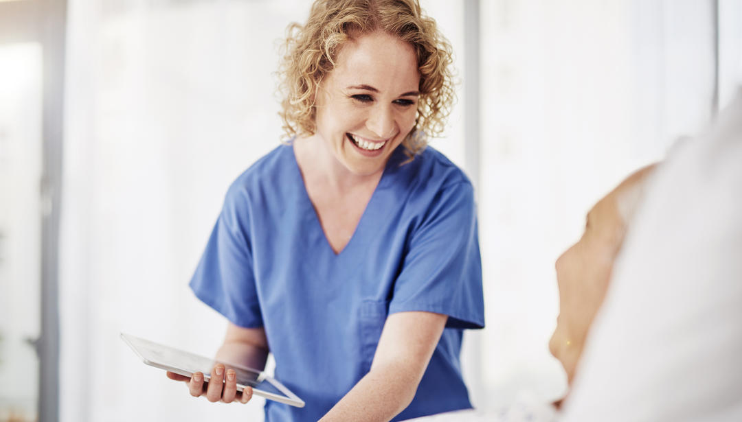 nurse assisting patient 