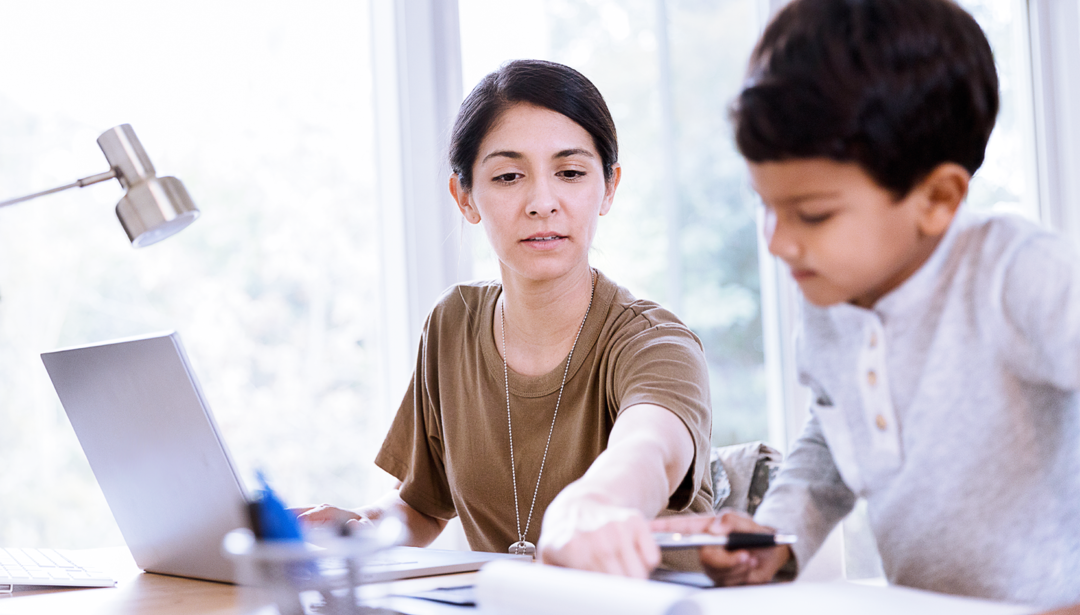 woman working with son