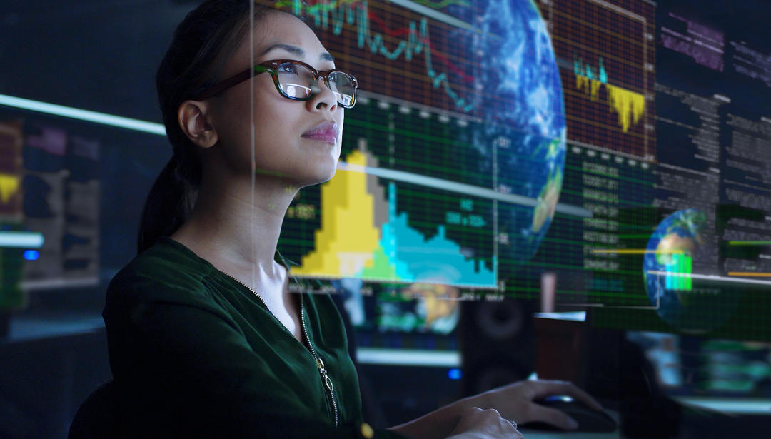 female using computer data analytics