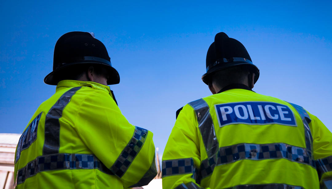 UK two male police officers 