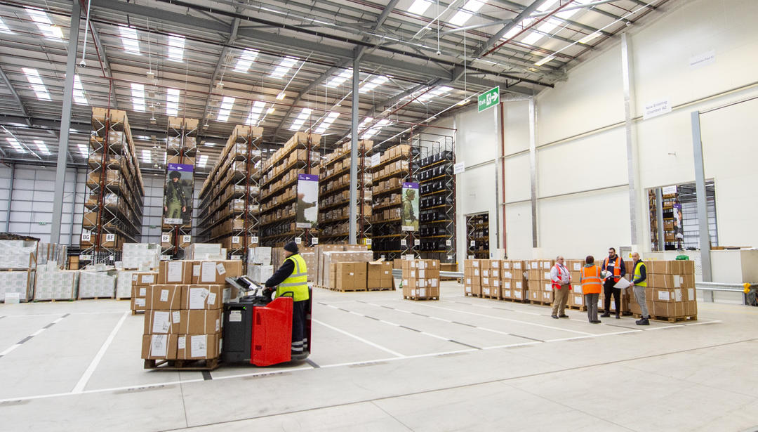 UK DFC logistics warehouse with people working