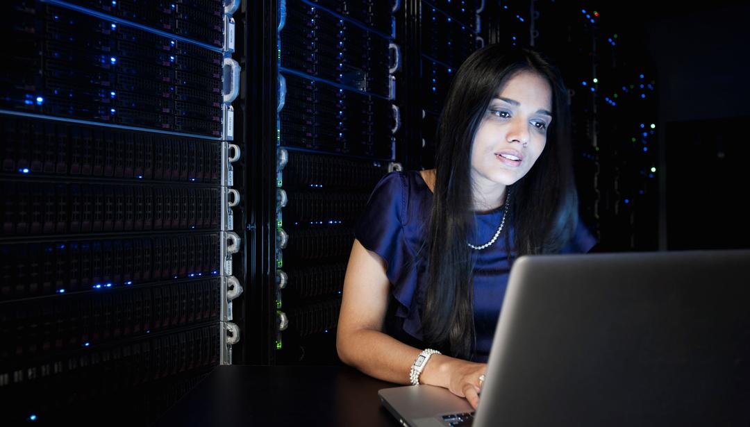 woman looking at laptop