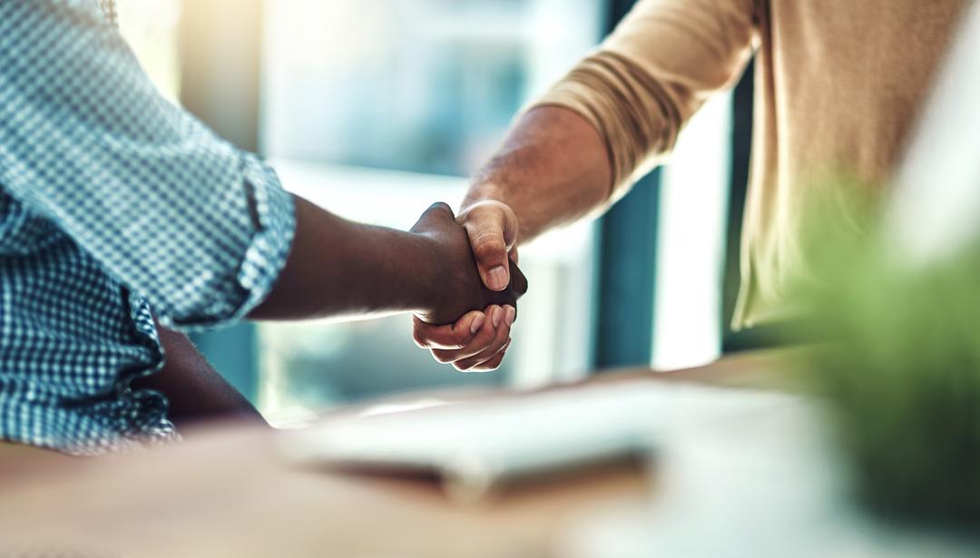 Two people shaking hands