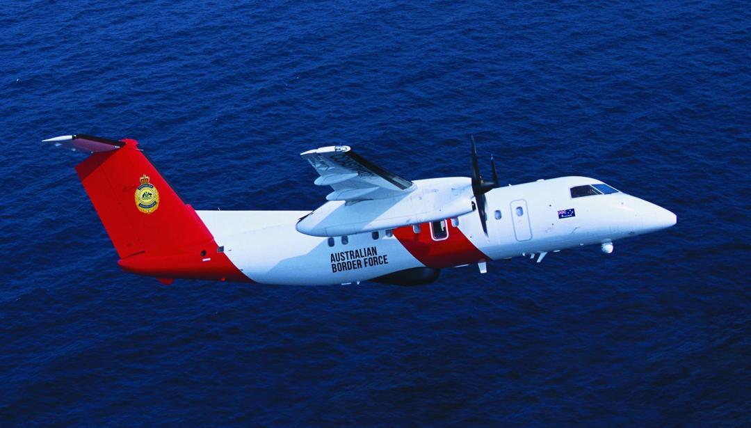 surveillance plane flying over water