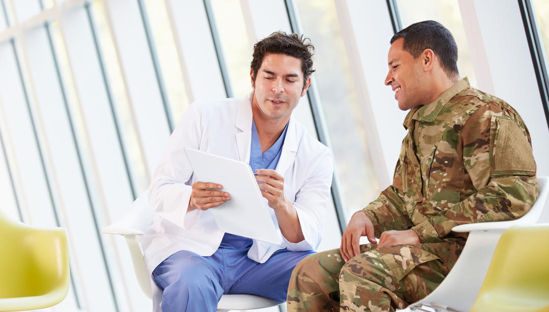 doctor with service member