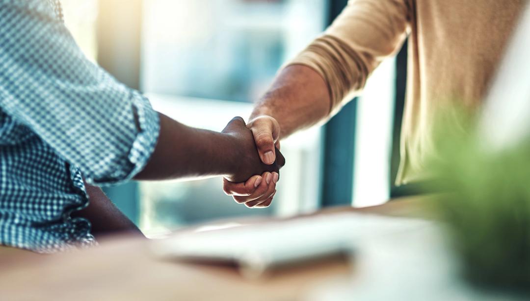 two people shaking hands