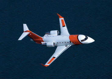 plane flying over water