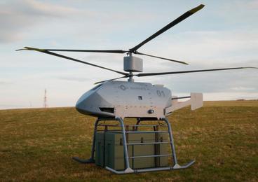 Helicopter with a chest being carried underneath it