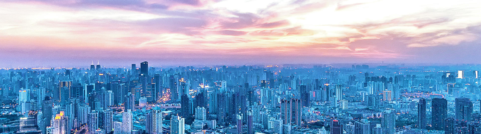 skyline of a city at sunset