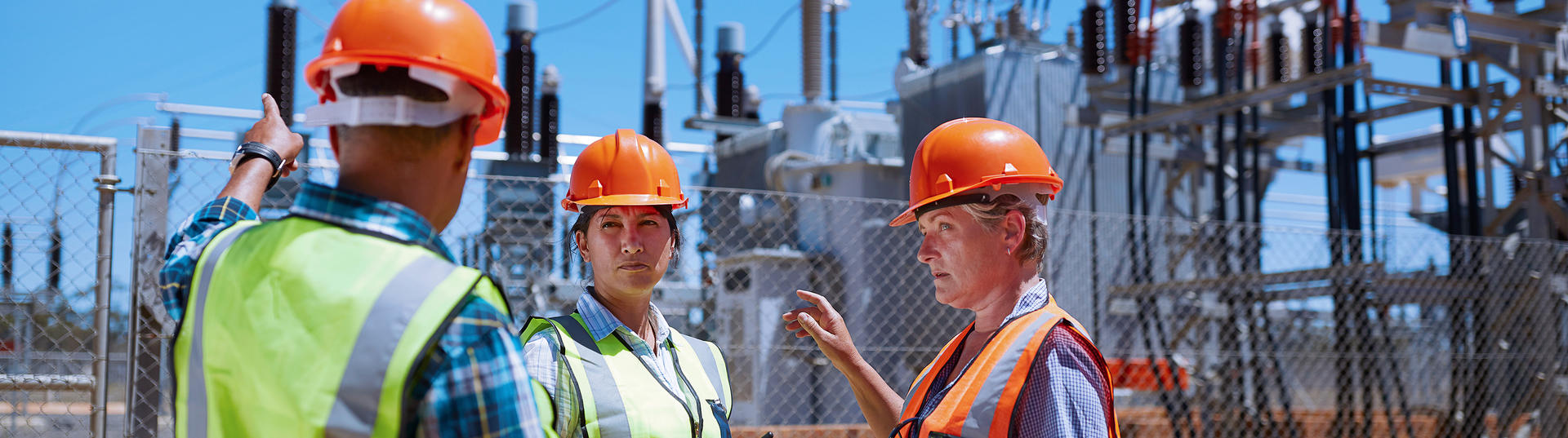 Employees inspecting utility assets