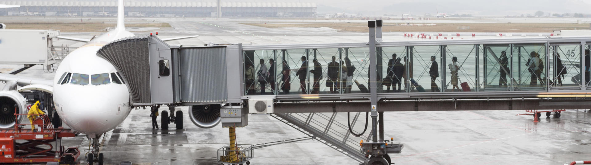 people boarding a plane