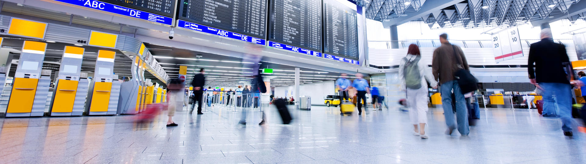 people walking through airport