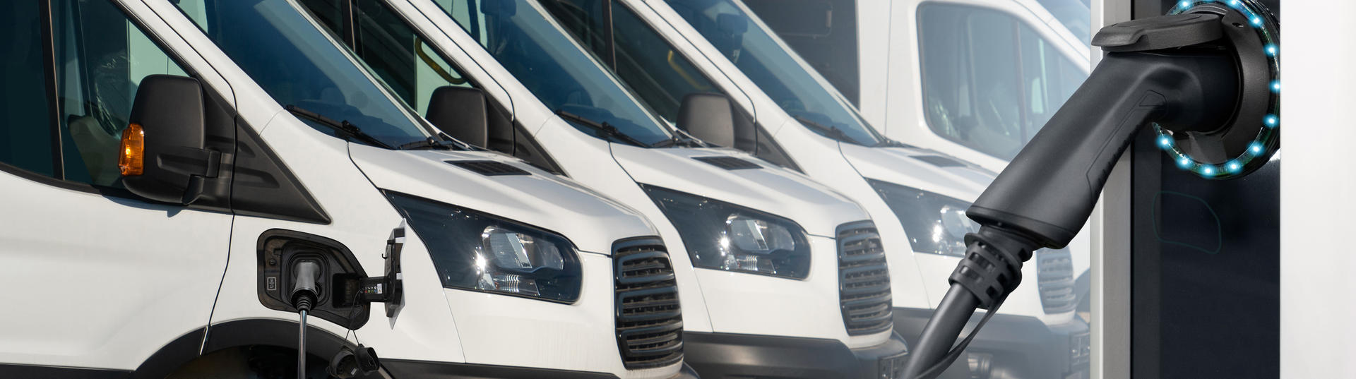 Row of electric fleet vehicles