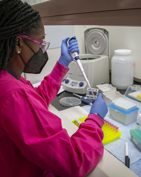 women taking samples in lab