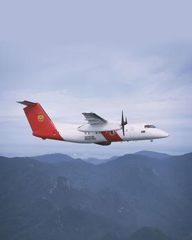 Plane flying over mountains