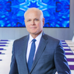 Tom Bell in the Leidos Board Room