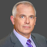 Headshot of JB Burton